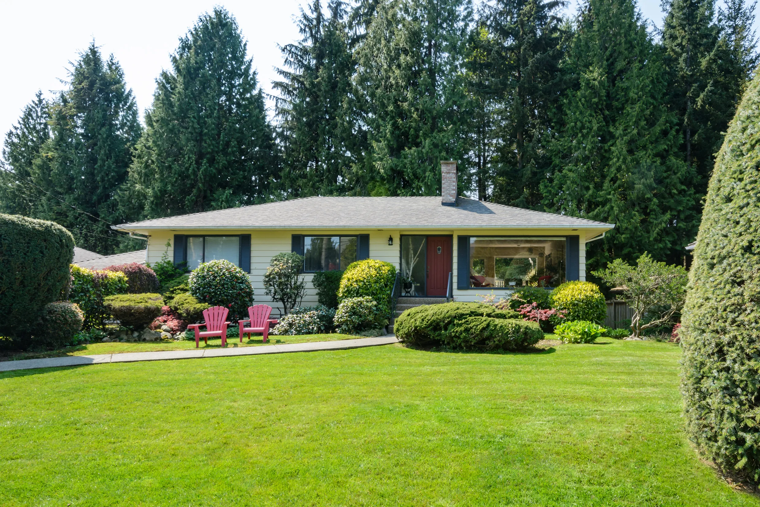 Mowed green lawn in front of a house